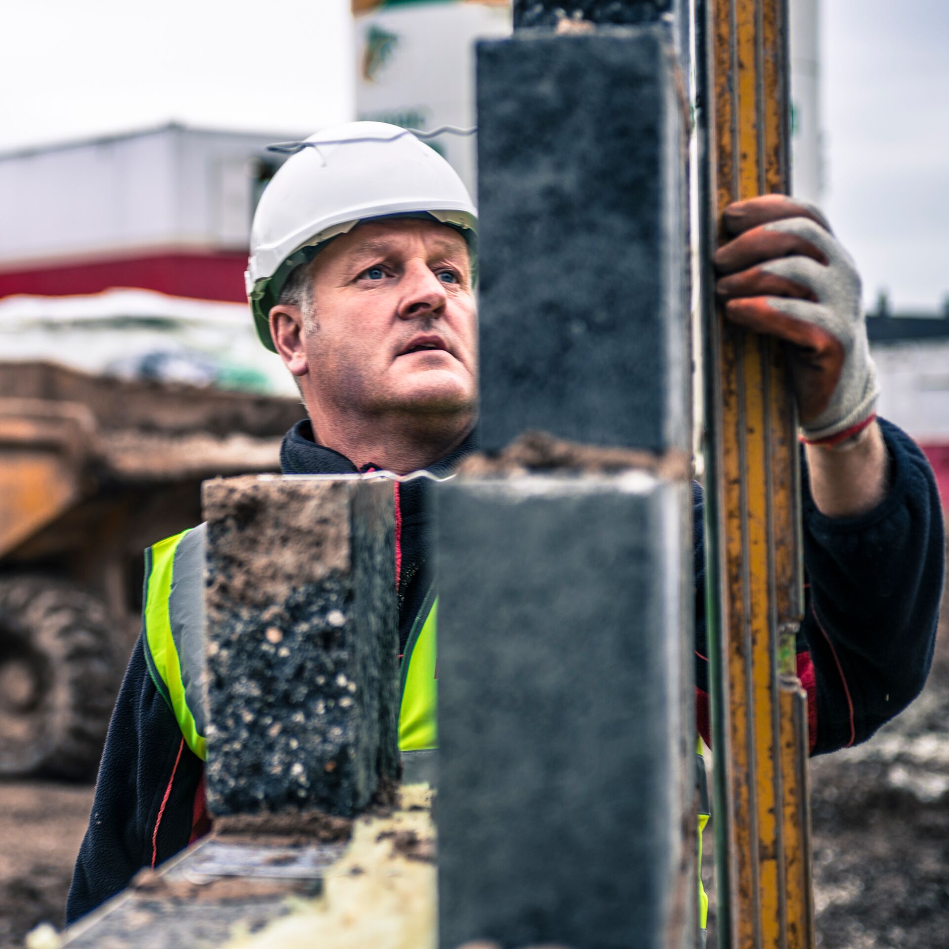 workers-laying-bricks-on-construction-site-2022-03-07-23-57-27-utc